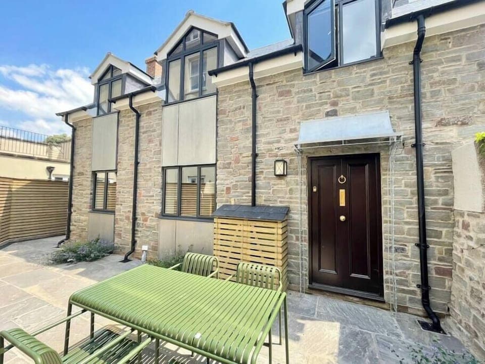 Front of house with private courtyard