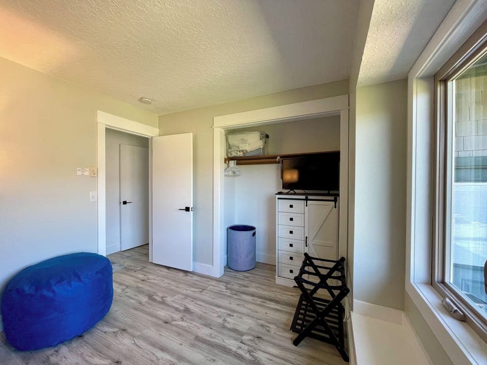 Bedroom 3, Roku TV, closet and dresser.