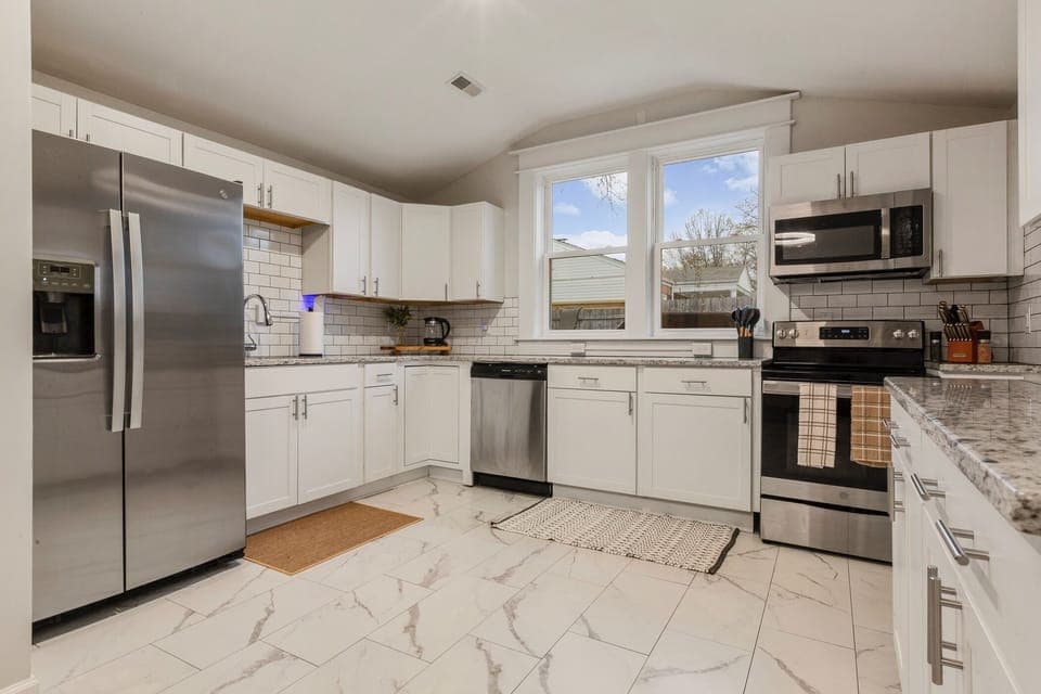 Well stocked Kitchen with Stainless Steel appliances 