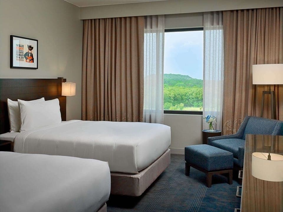 Wake up to serene views from this bright, airy room.