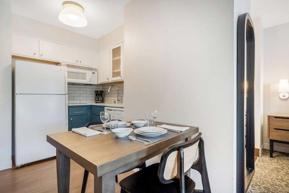 Enjoy easy meals and laughter around this cozy dining nook.