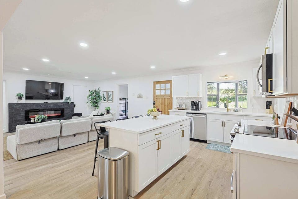 Open kitchen seamlessly flowing into living room