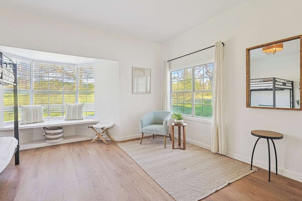 Cozy chair in the corner, perfect for relaxing by the sunlit window