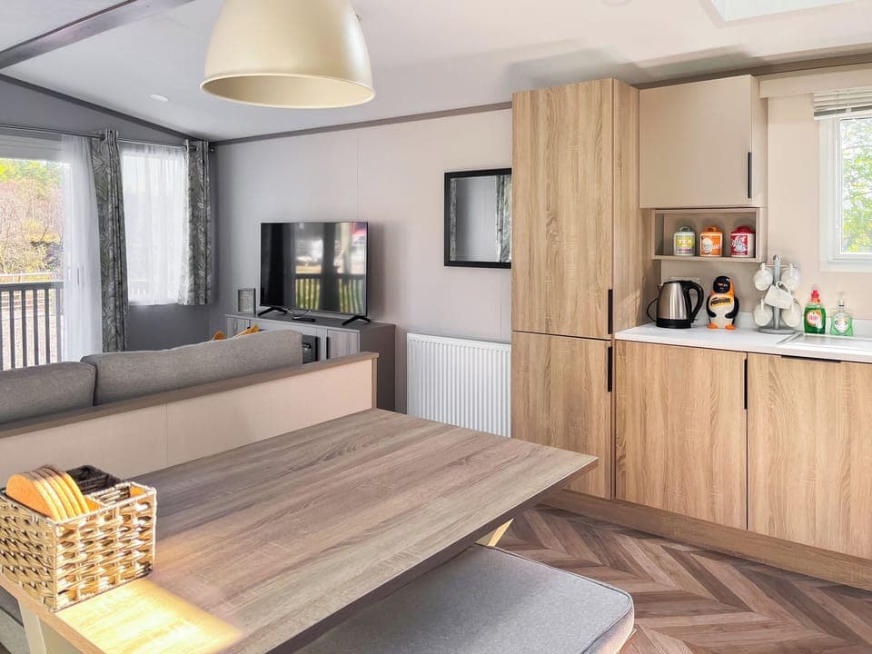 kitchen dinning area | Katie&rsquo;s Cosy Caravan - Shepherds Holidays, Kilmallieu