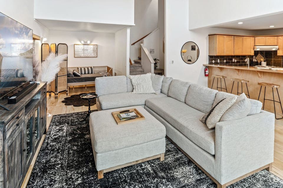 Living area is nice and bright with large windows