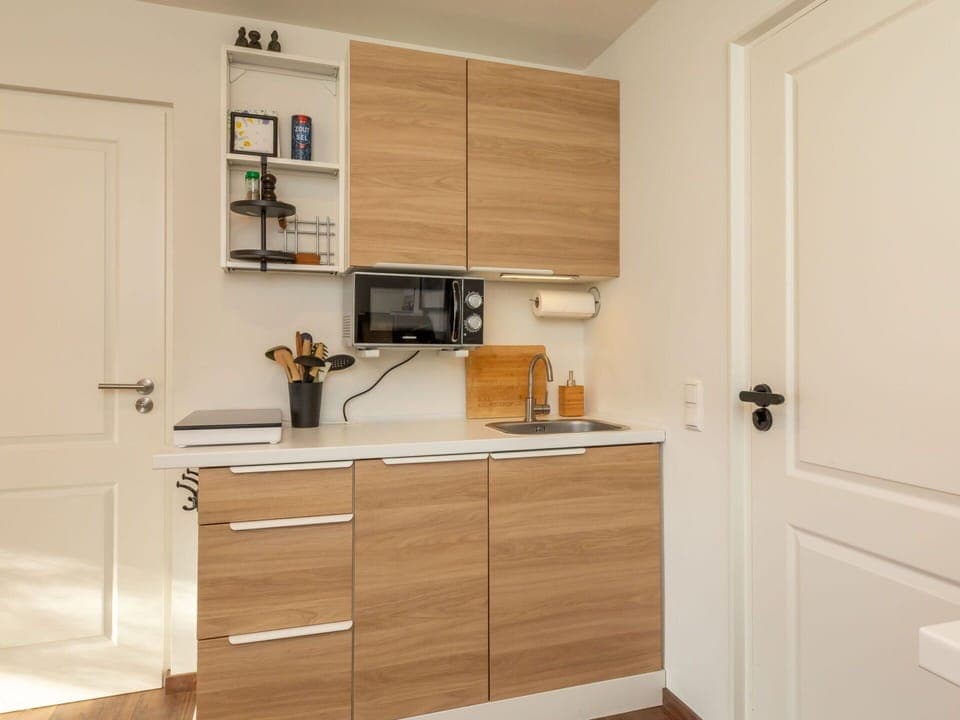 Cabinetry, Furniture, Wood, Flooring, Countertop, Cupboard, Interior Design, Floor, Drawer, Kitchen