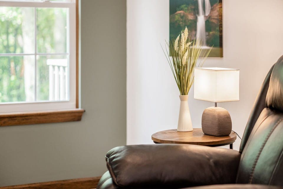 Tranquil office with desk, ideal for remote work or focused activities.