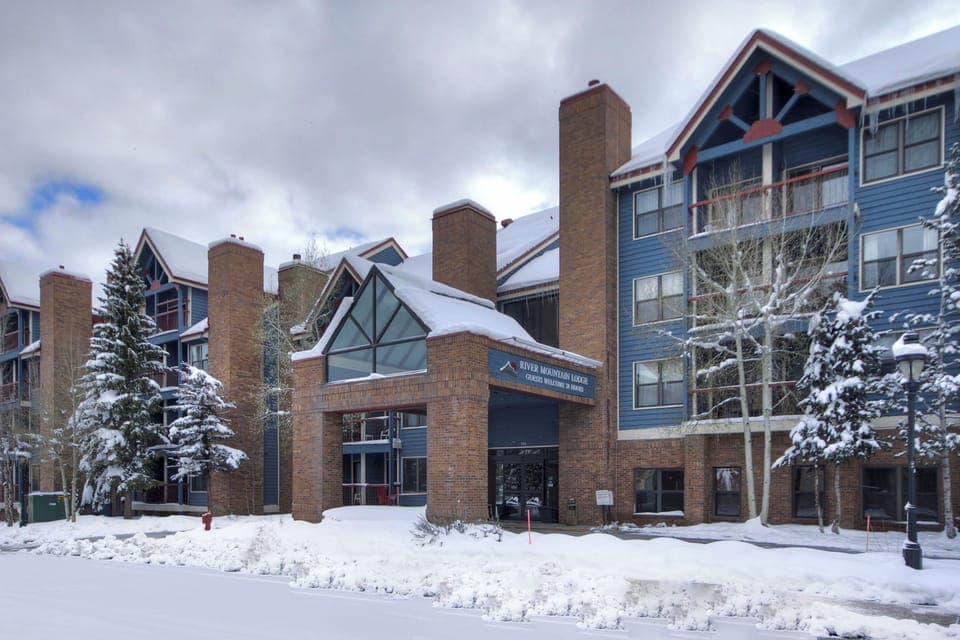 Lodge-style condo in winter snow