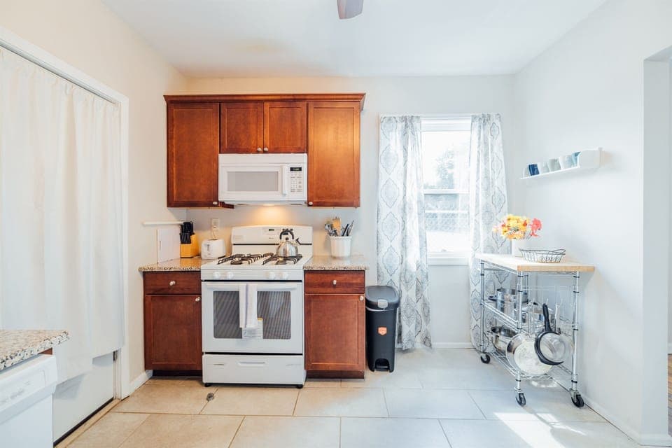 Kitchen with a complete set of cooking essentials.