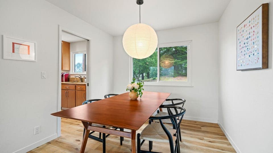 Larger dining space adjacent to the kitchen offers an expansive area for grouped dining.
