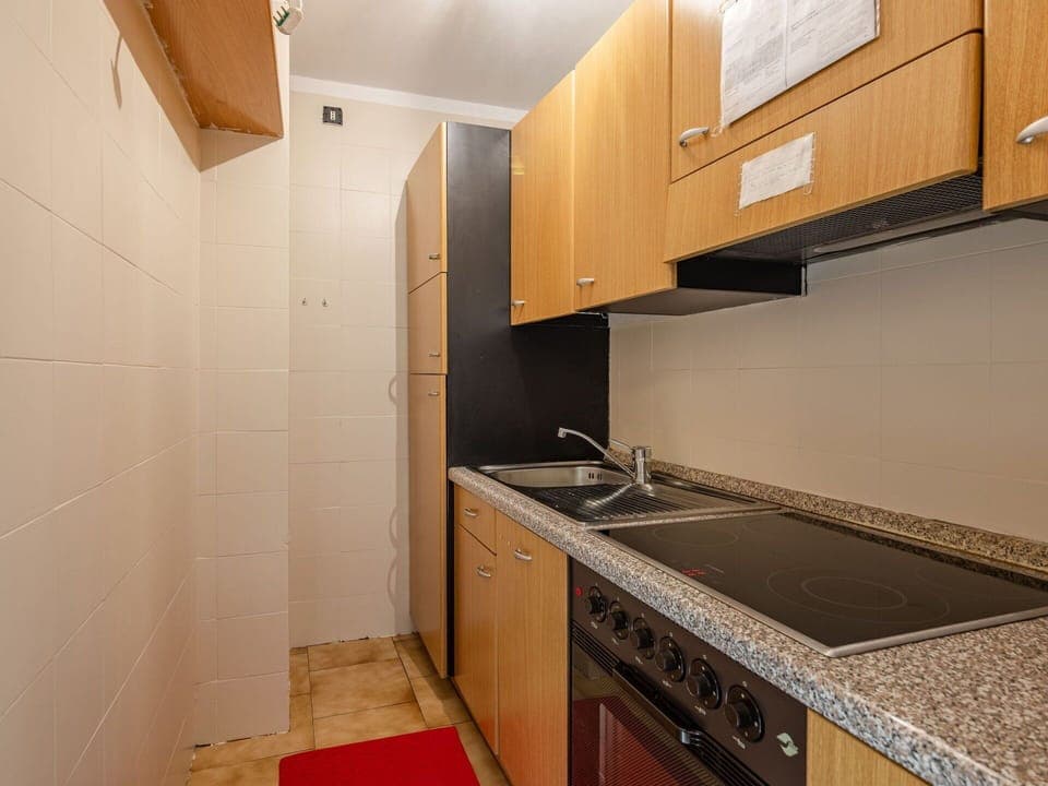 Cabinetry, Countertop, Property, Kitchen Stove, Kitchen, Kitchen Appliance, Wood, Home Appliance, Flooring, Interior Design