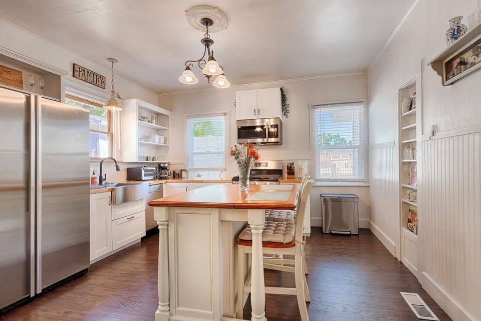 Newly renovated chef's kitchen with dishwasher, stove, microwave, toaster oven