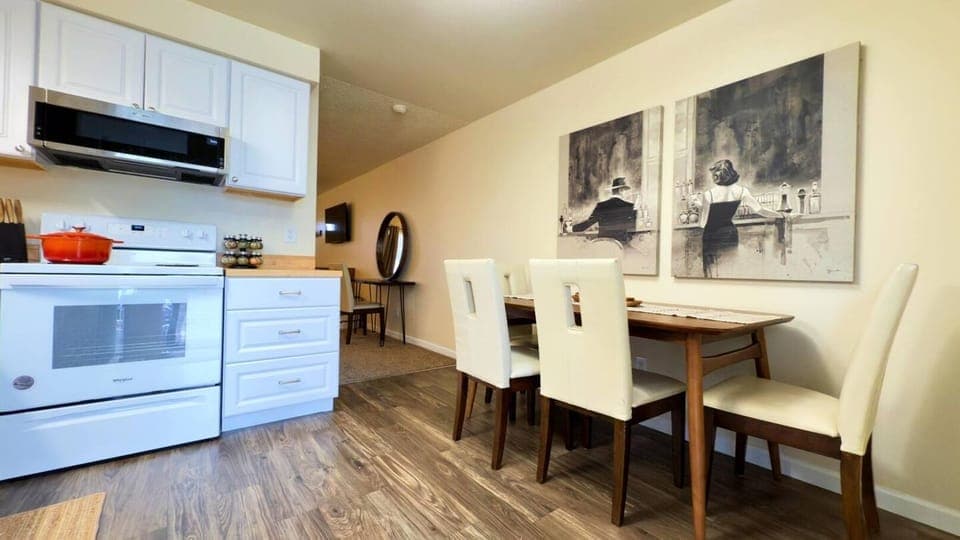 Fully stocked kitchen with dining for four. 