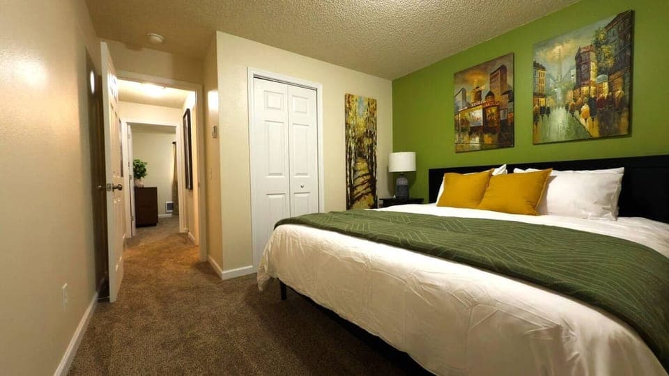 Primary Bedroom - king bed, brand new luxury mattress, down pillows and comforter, duvet cover, closet with hangers, USB stations at each side table. Blackout curtains.