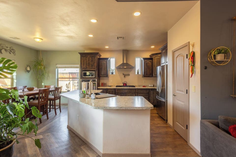 Spacious kitchen with island, dishwasher, 5 burner gas stove, pot filler