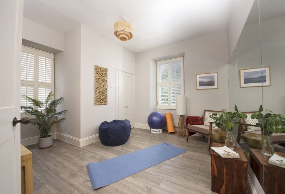 Henscath House, Mullion. Ground Floor: Henscath also offers a yoga studio with an en-suite shower room