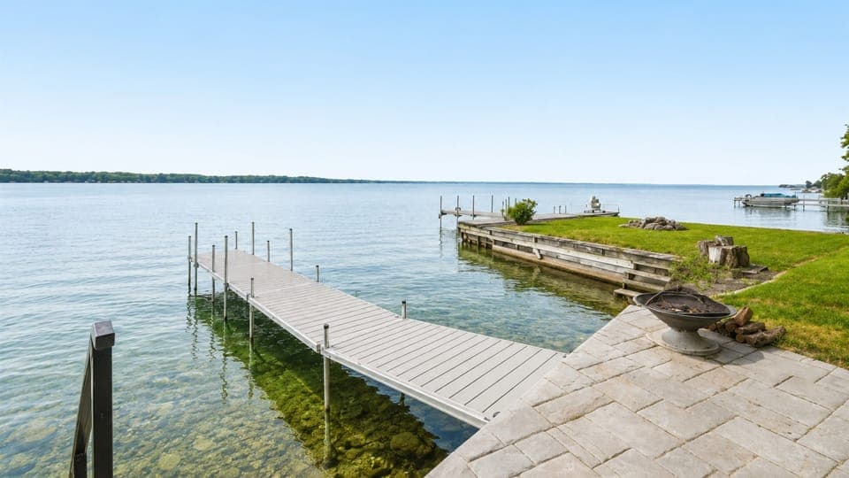 Relax on our beautiful concrete patio with the dock leading out to beautiful Cayuga lake.