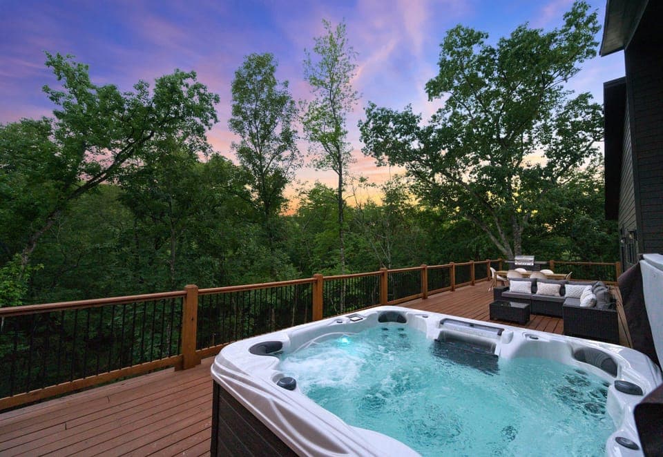 Unwind in our outdoor hot tub with peaceful wooded views—perfect for those crisp evenings!