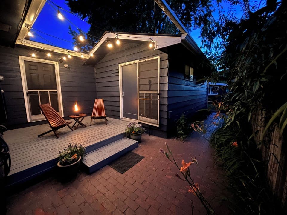 Private patio & entrance behind a gated fence.