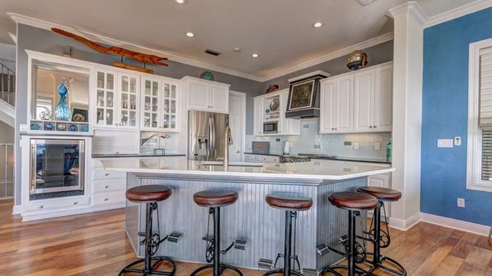 Your spacious gourmet kitchen features granite counters, stainless appliances, and a breakfast bar where you'll love starting your mornings.