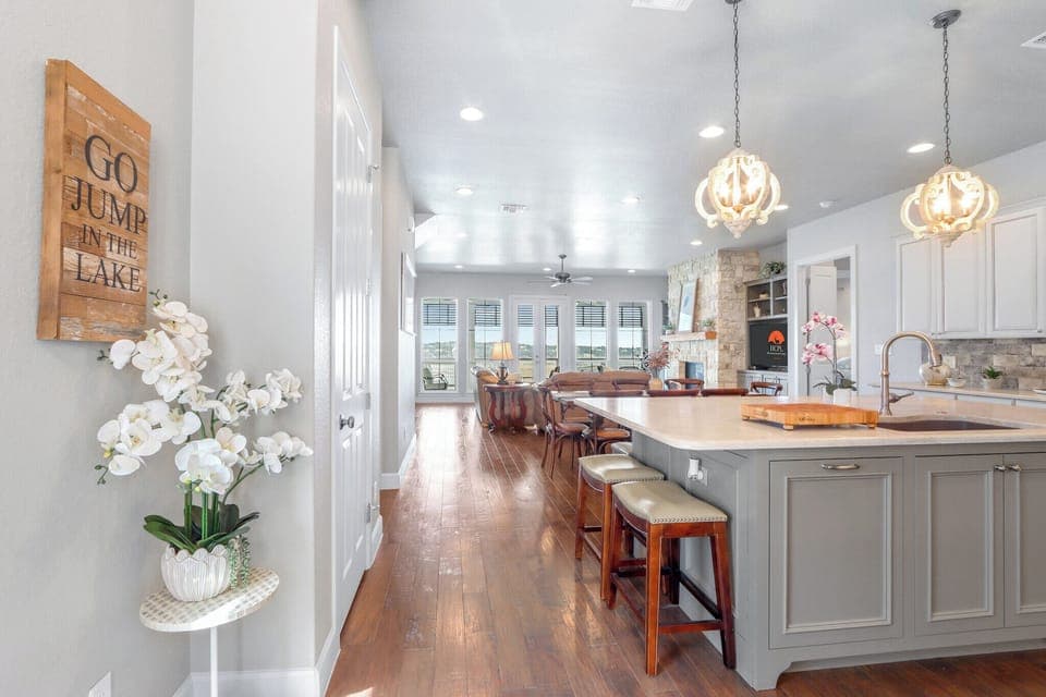View as you enter the home.  You will walk past the kitchen into the main living area of the home.