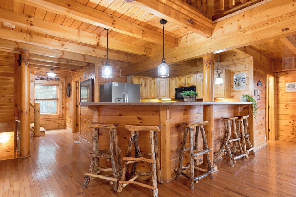 Barstool seating near the kitchen.