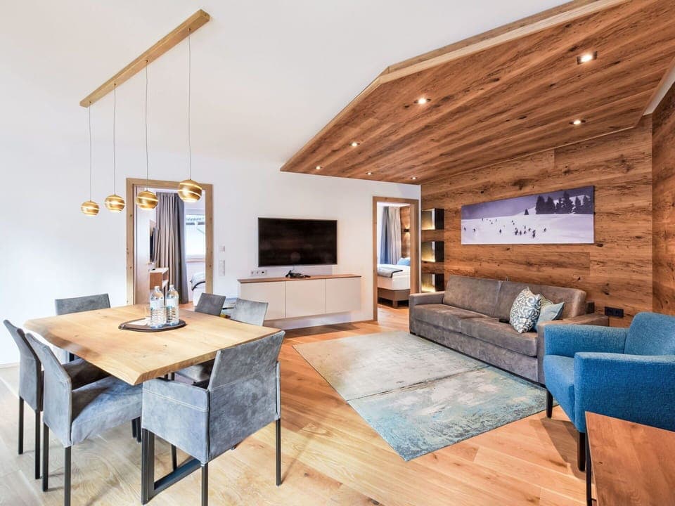 Furniture, Interior Design, Flooring, Couch, Wood, Floor, Wood Flooring, Living Room, Ceiling, Lighting