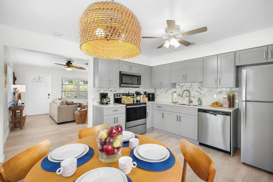 Enjoy your meals at our 4-person dining area. (Find extra foldable seating in the master bedroom.)