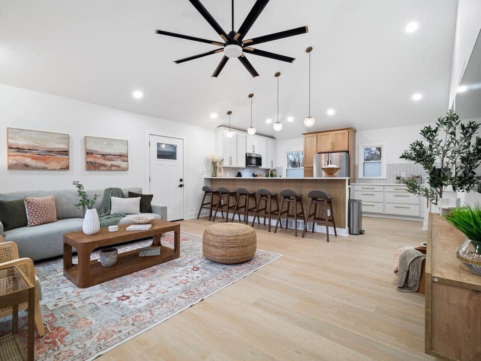 The pull-out sofa bed is ready for guests, while the open kitchen is perfect for entertaining.  A home that`s both stylish and practical.