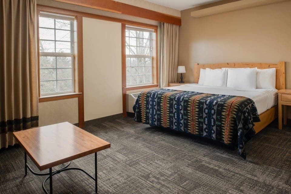 Stretch out in a spacious room framed by oversized windows.