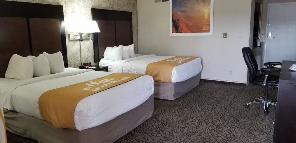 Unit with 2 Queen beds. Exact unit will be assigned upon arrival. Views, colors, and decor may vary.