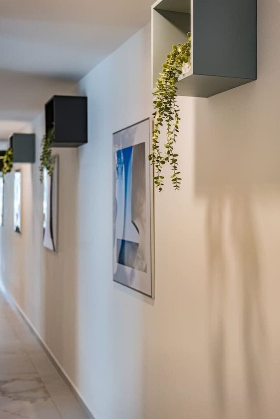 Minimalist hallway art creating a calming atmosphere throughout the space.