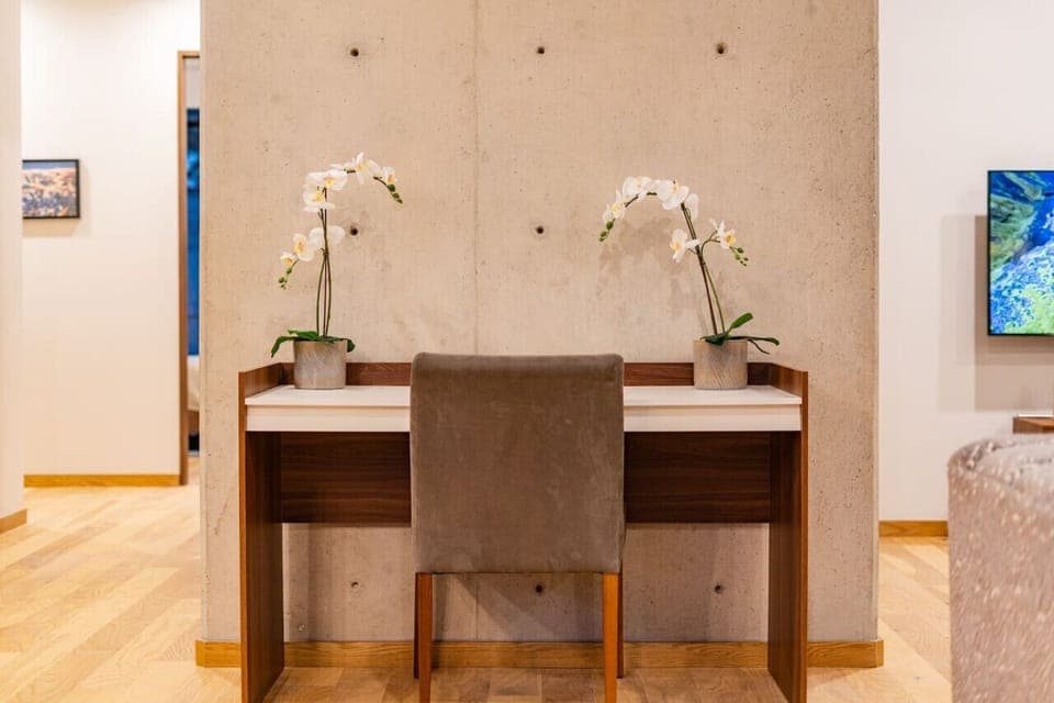 Eye-catching artwork and vibrant furniture add character to this chic home.