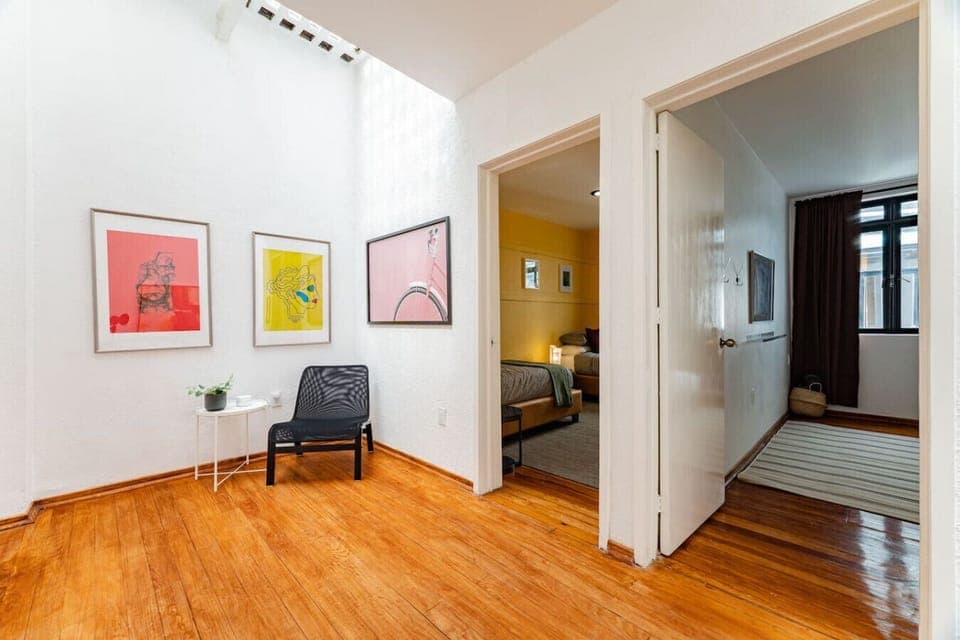 Entryway with view into bedrooms