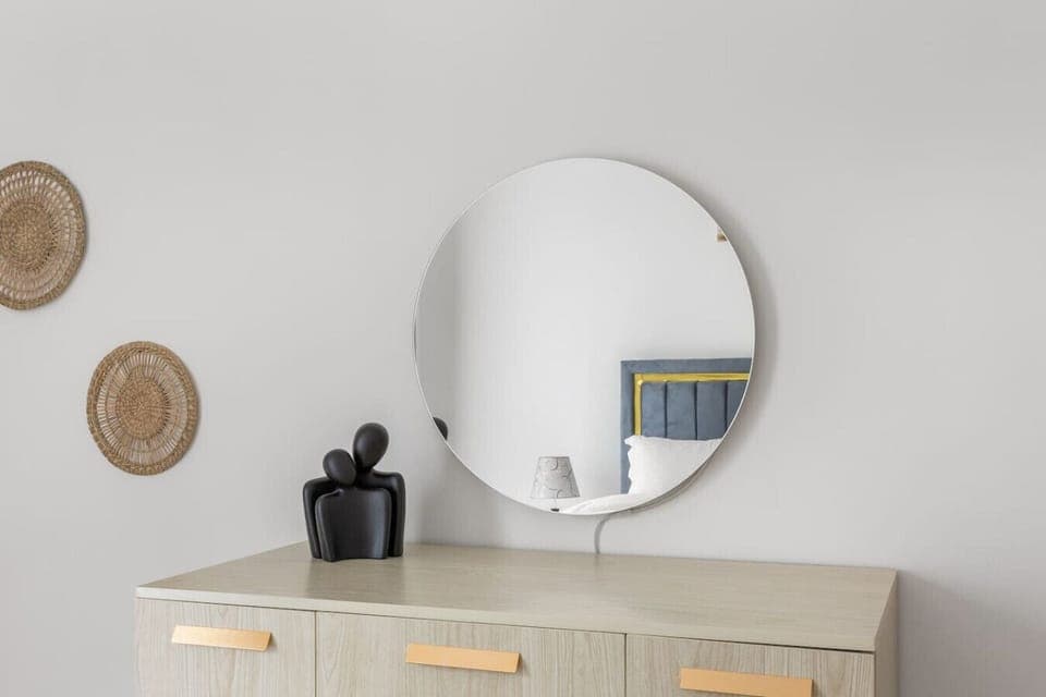 Stylish Bedroom: Chic decor and elegant lighting create a welcoming retreat for your stay!