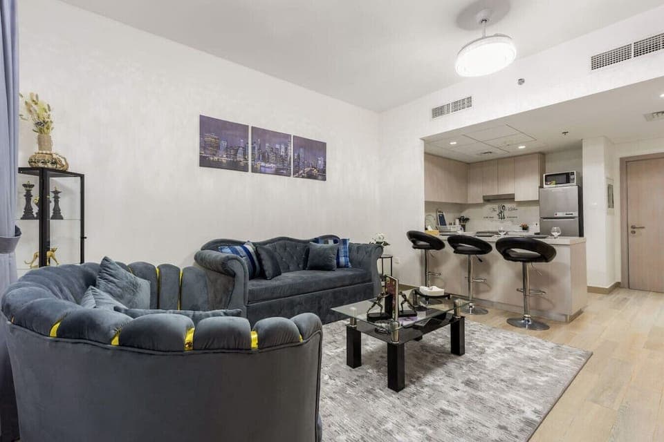 Living Room: Chic seating and stylish decor create a perfect spot for relaxation and fun!