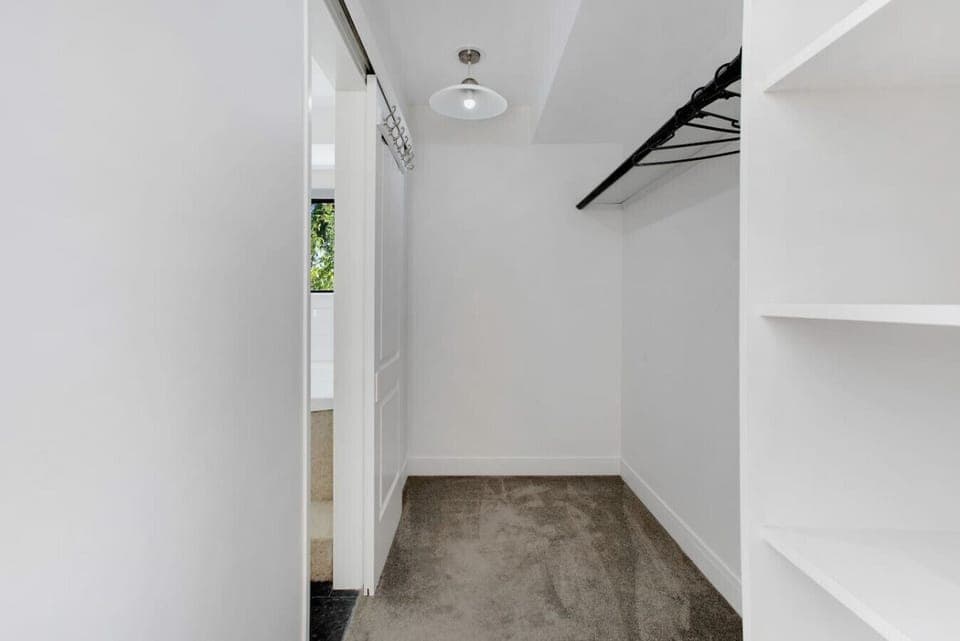 There is a walk-in wardrobe from the main bedroom.