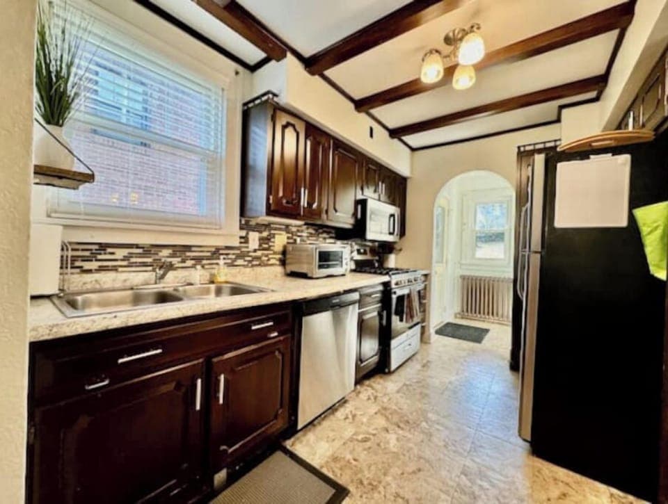 Fully equipped kitchen with drip coffee maker