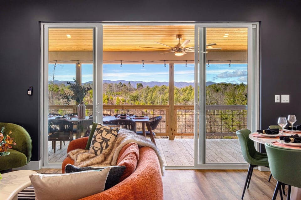 Enjoy stunning long-range mountain views right from the heart of the home! Whether you're cooking in the kitchen, dining with friends, or relaxing in the living room, you'll be surrounded by nature’s beauty.