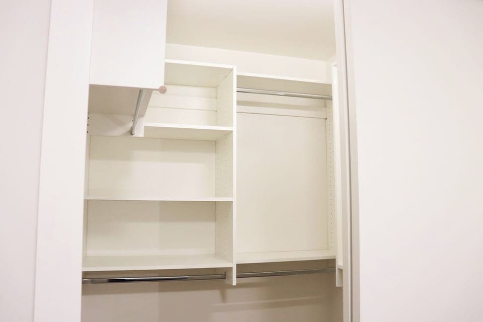 Walk-in closet with ample space.