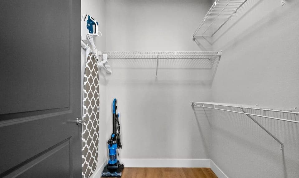 Master Closet Offers Plenty of Storage and a Full Size Ironing Board and Iron. Spill Something? Use the Vacuum to Make the Clean-Up Simple. 