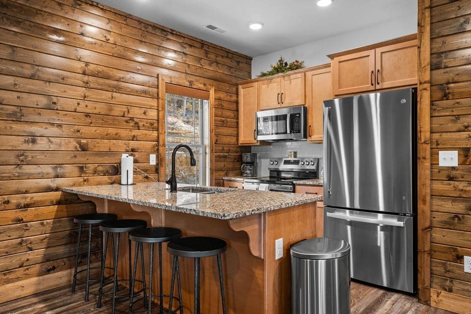 Fully Equipped Kitchen with Additional Bar Seating