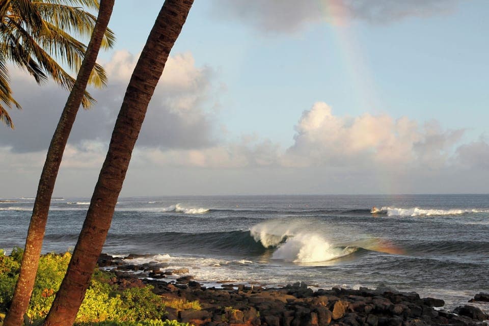 Ride the waves at the surfers Lawai Road.
