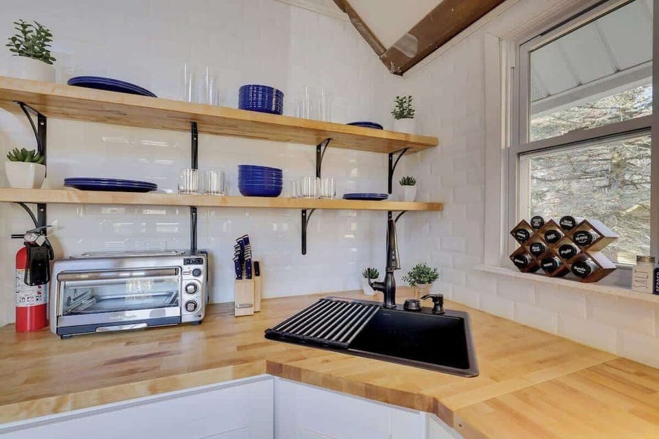 The kitchen comes with all the basic essentials, so you can enjoy home-cooked meals during your say!