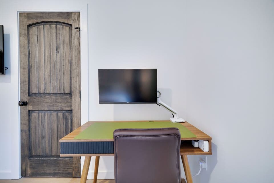 Desk in 3rd floor master ensuite bedroom for a remote workspace. 