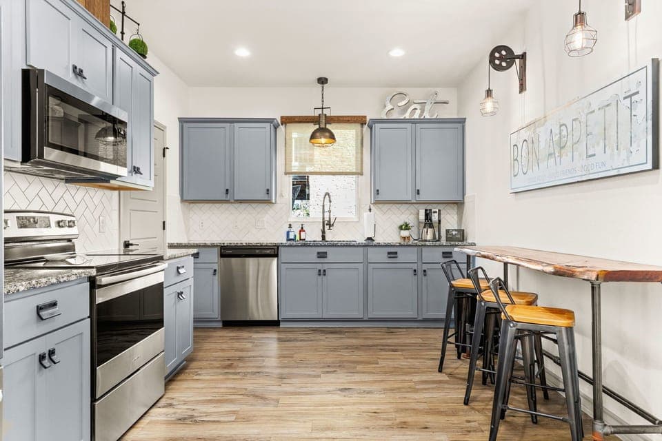Cook, dine, and feel at home in this well-stocked kitchen.