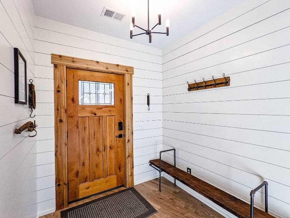 entry into the lower-level living area (outerwear dressing area)