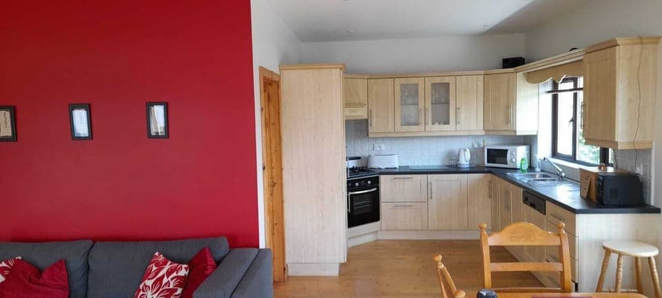 Kitchen area with oven, gas hobs, dishwasher, fridge-freezer