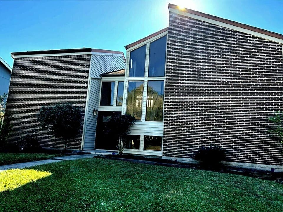 custom built home with an abundance of light