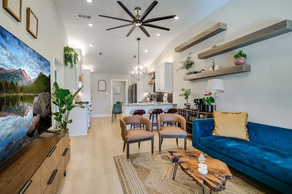 Mid-century modern living space with natural wood highlights. 